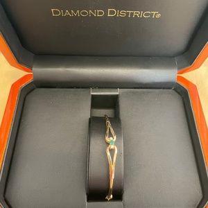 Diamond District - gold emerald and Diamond cuff